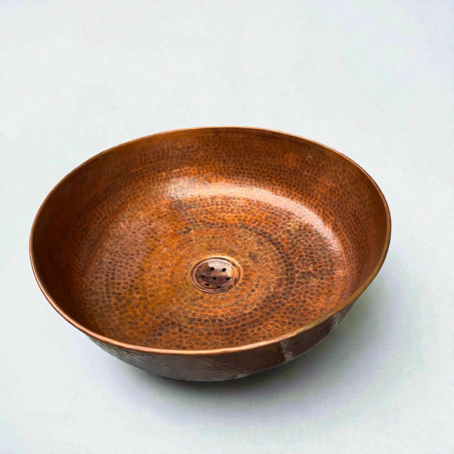 Round hammered copper vessel sink for bathroom vanity