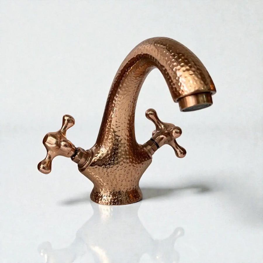 Copper bathroom faucet with warm artisan finish