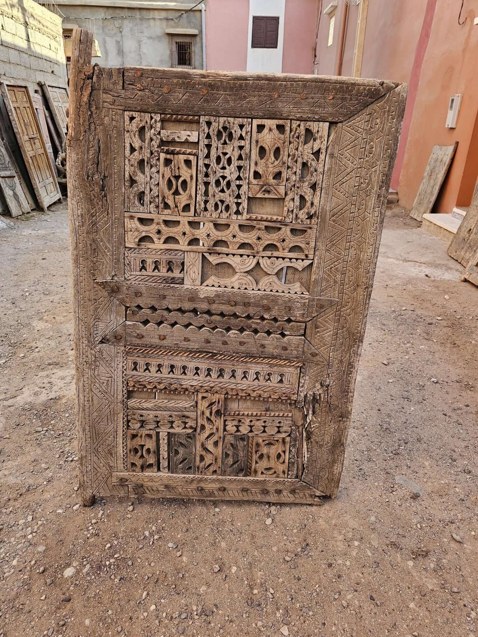 Vintage floral door with vines and blossom carving detail