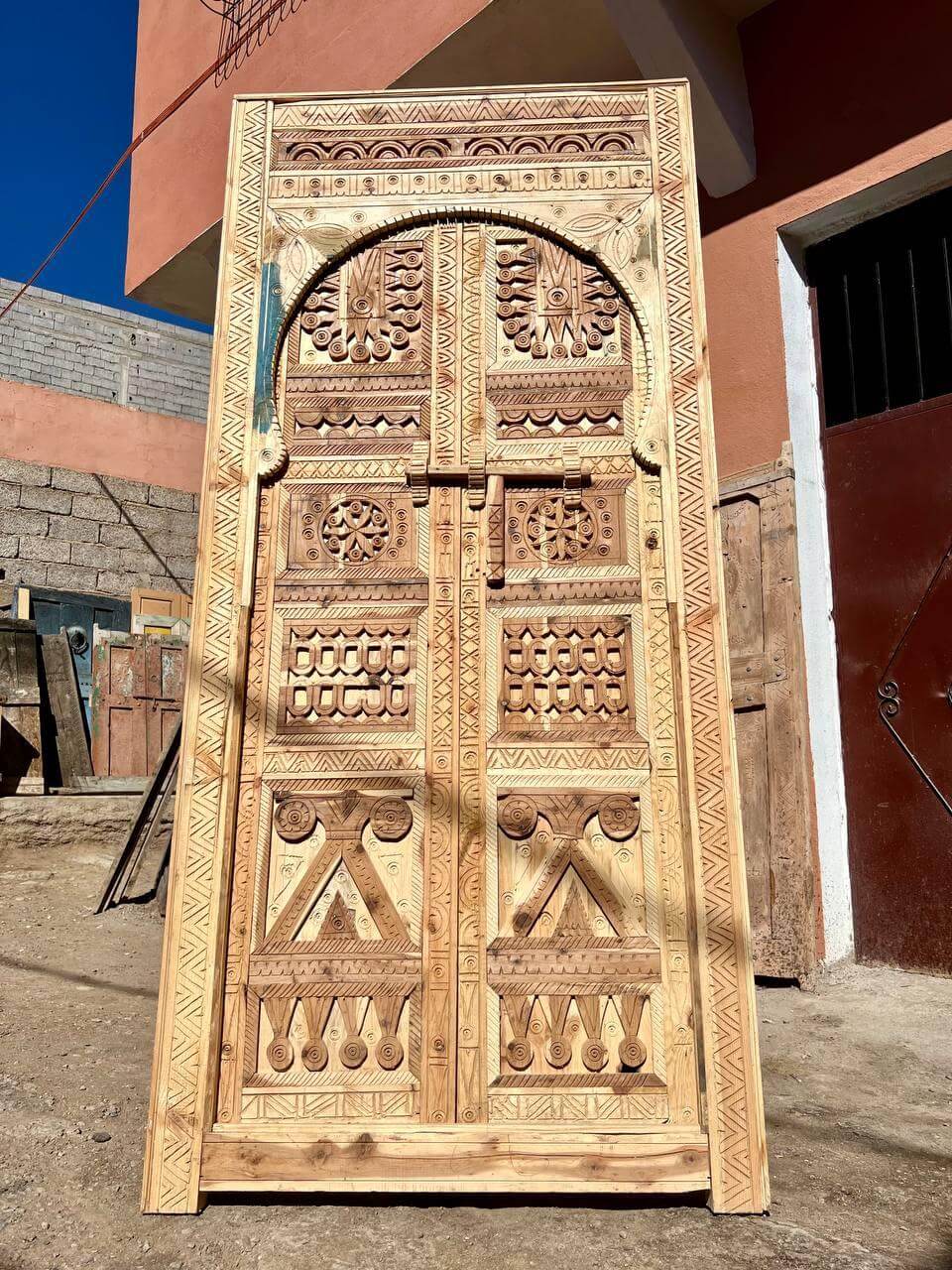 Custom Moroccan wood door with Berber Amazigh hand-carving