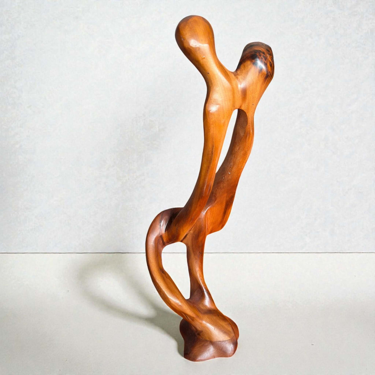 Handmade Moroccan Thuya sculpture with warm burl wood grain