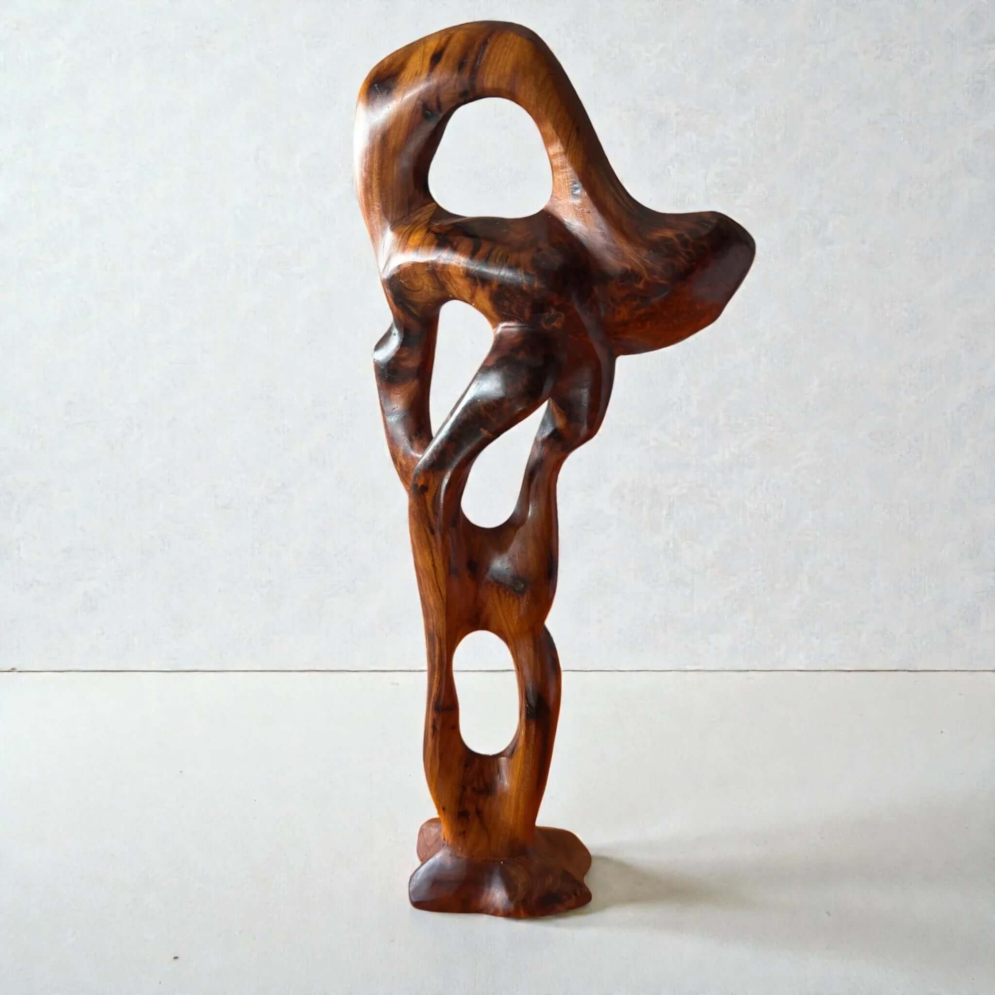 Handmade abstract wood sculpture with natural grain for shelf decor