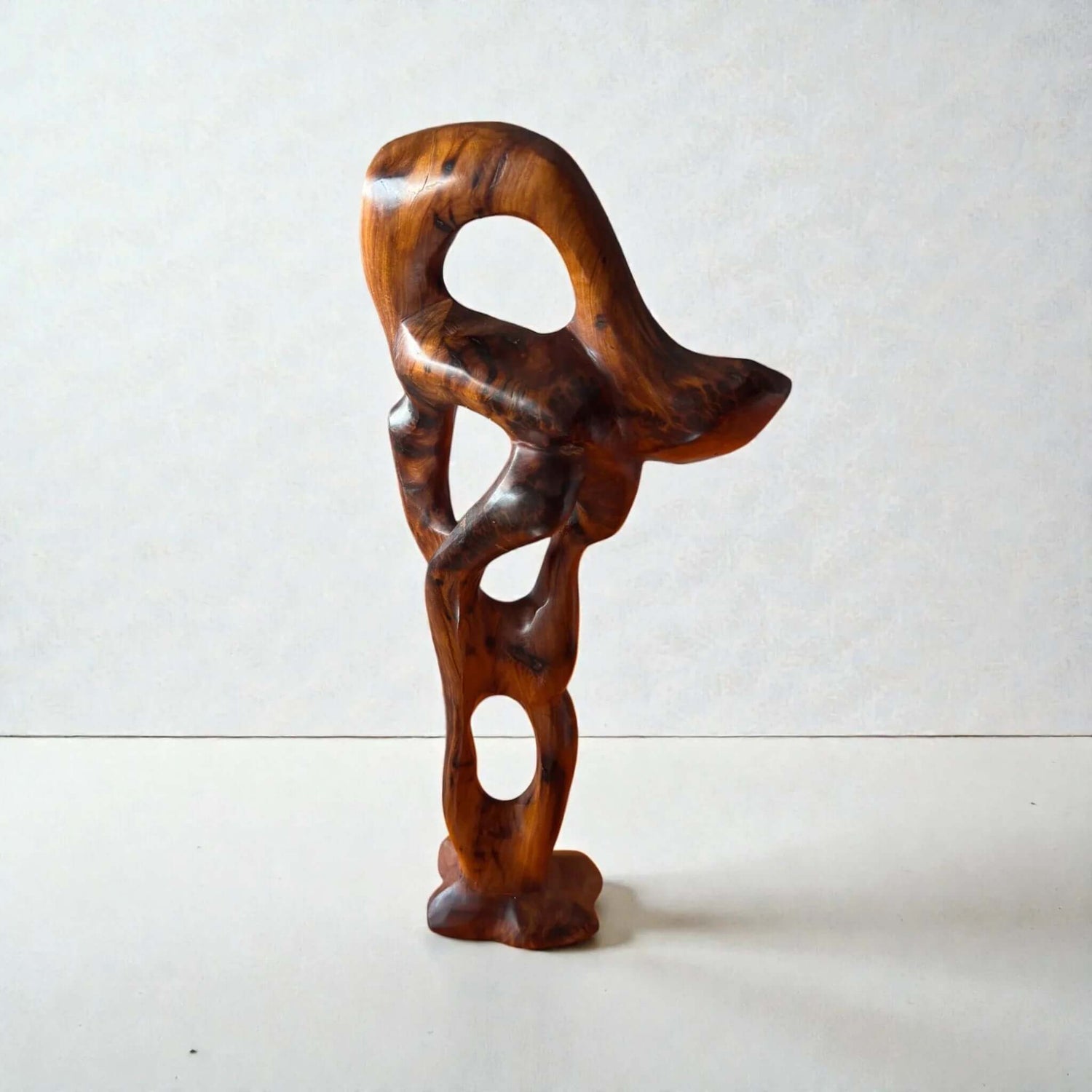 Handmade Moroccan abstract wood sculpture with natural grain