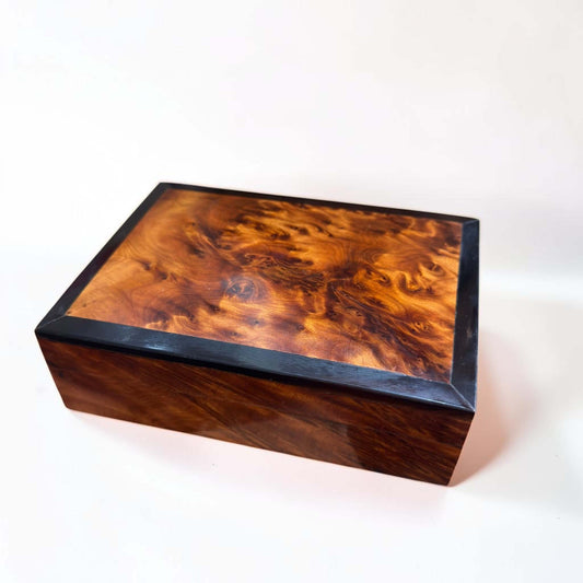 Handmade Moroccan Jewelry & Keepsake Box in Thuya burl wood with a sleek black frame.