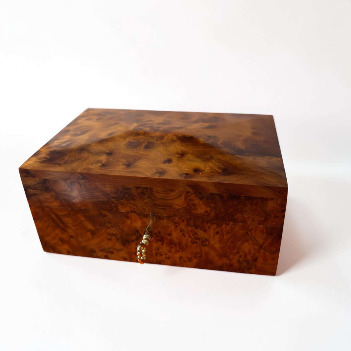Thuya Burl Wood Jewelry Box with unique grain, handcrafted Moroccan keepsake box, lockable design.