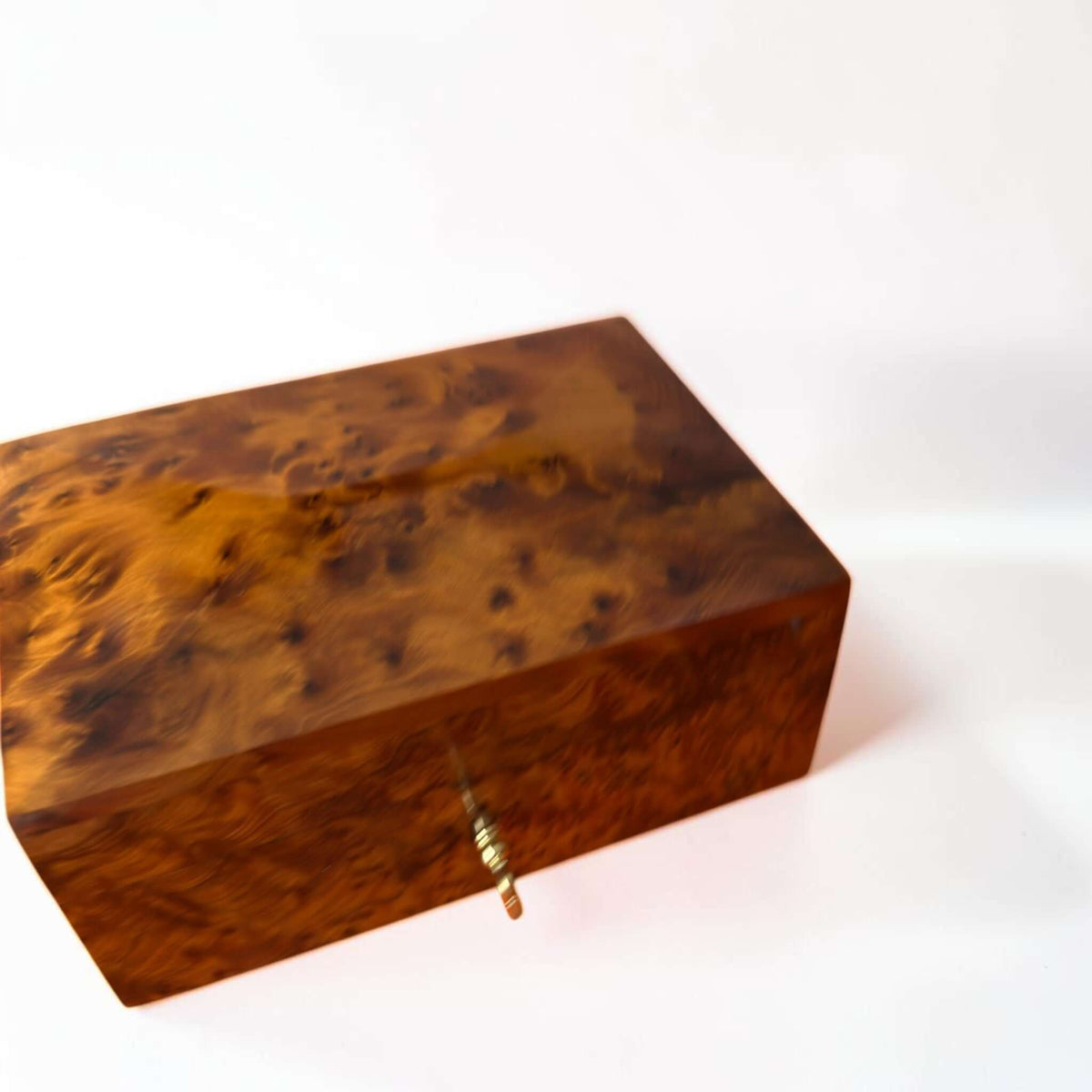 Thuya Burl Wood Jewelry Box with unique grain, handcrafted, lockable design for jewelry storage.