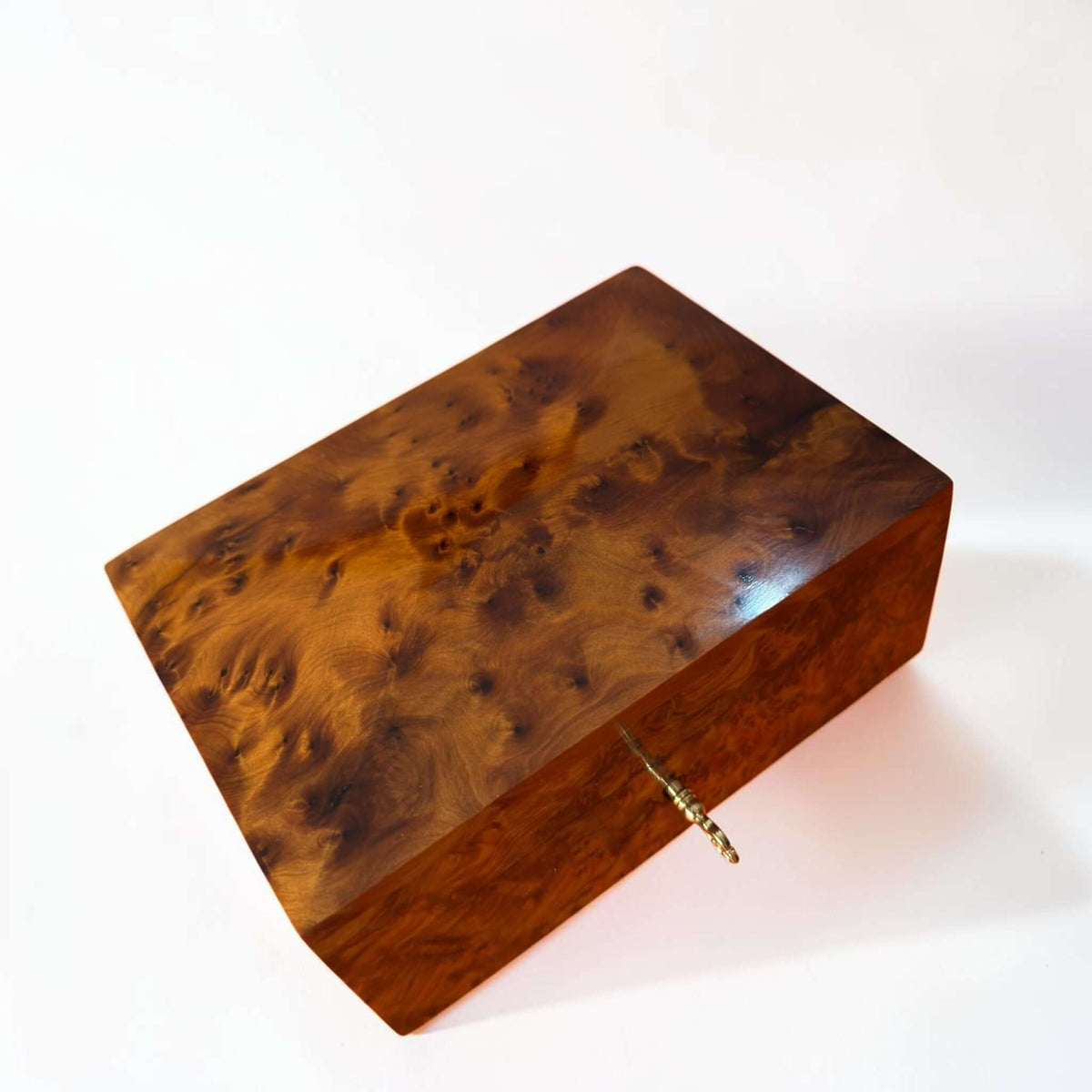 Thuya Burl Wood Jewelry Box with unique grain and golden lock, handcrafted Moroccan wooden storage.