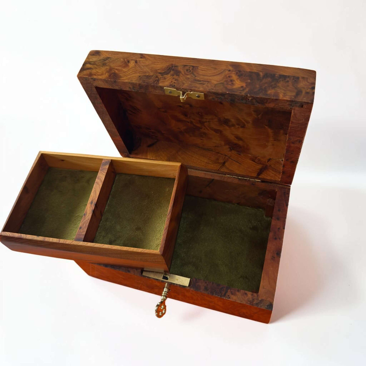Thuya Burl Wood Jewelry Box with lockable design, plush interior, and handcrafted compartments for jewelry storage.