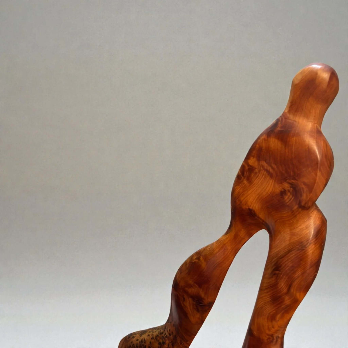 Moroccan abstract wood sculpture with warm artisan finish