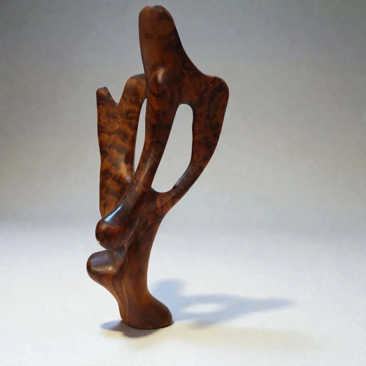 Moroccan hand-carved wood sculpture with artisan surface detail