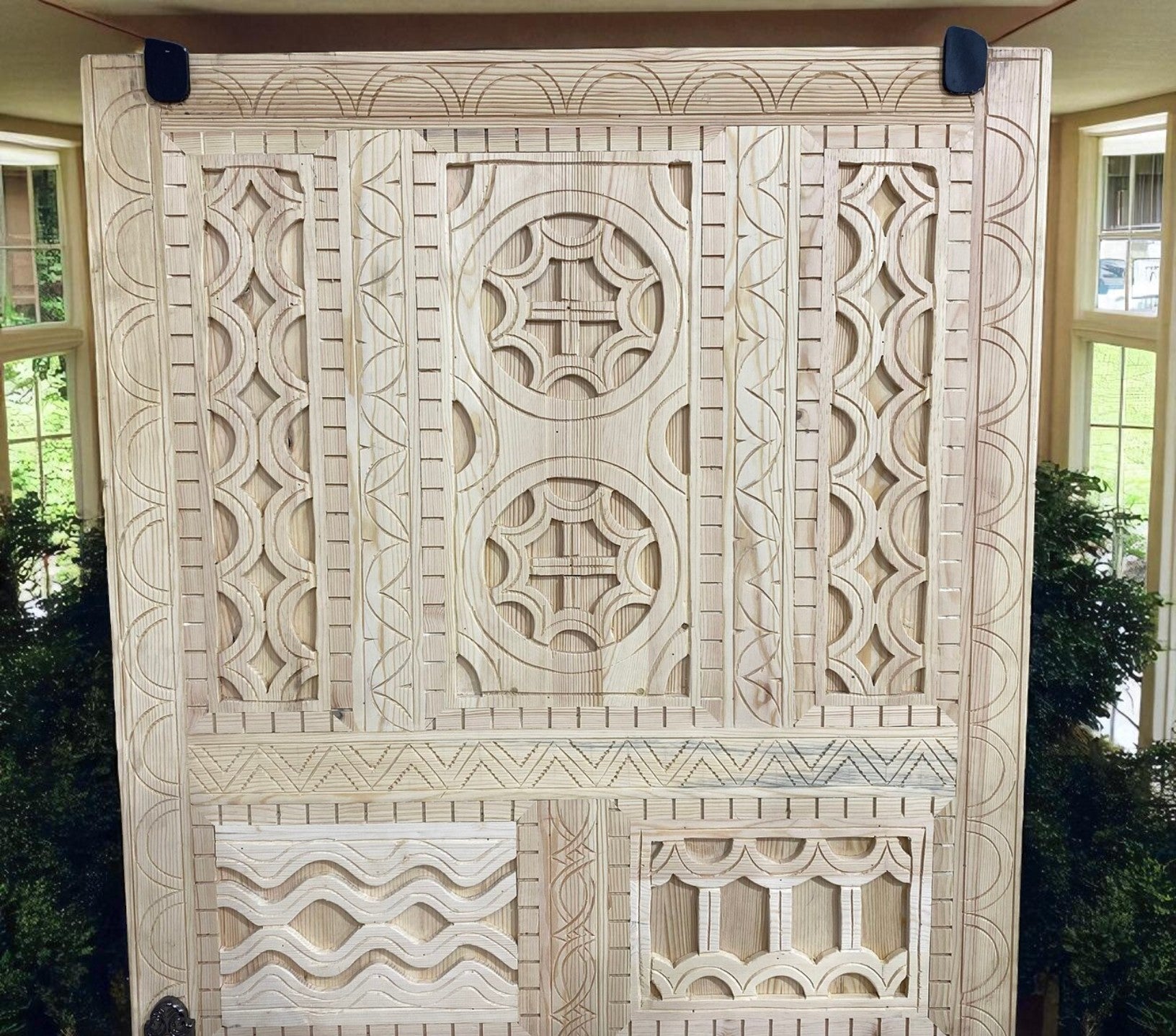 Elaborately carved wooden door.