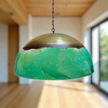 Beautiful Copper Dome Pendant Light with a unique green patina finish, ideal for modern interior decor.