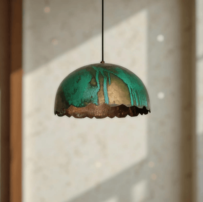 Green Patina Scalloped Copper Dome Pendant Light hanging in a bright room, showcasing its unique patina finish.
