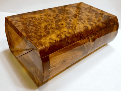 Luxury Wooden Jewelry Box – Handmade Moroccan Thuya Burl with polished amber finish and unique swirling grain.