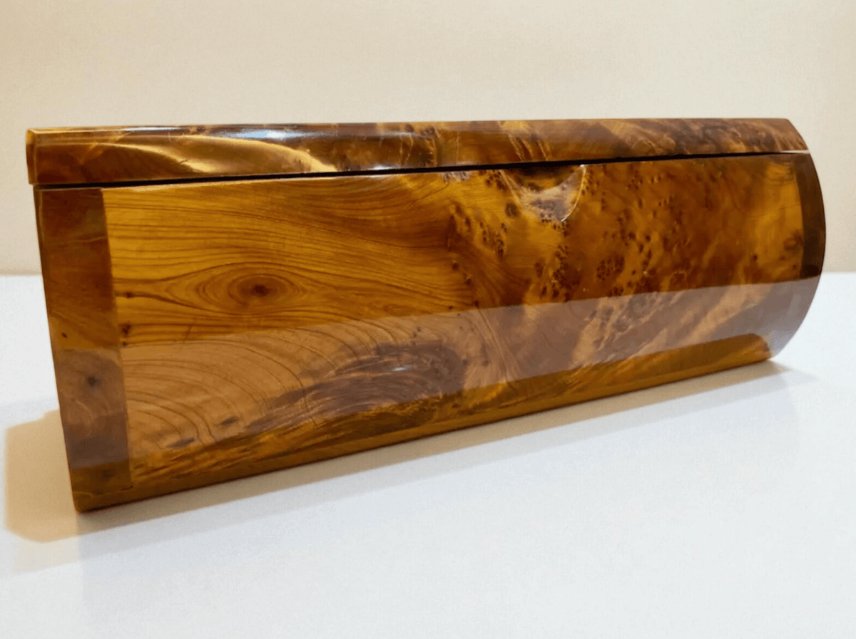 Luxury Wooden Jewelry Box – Handmade Moroccan Thuya Burl with polished amber finish and distinctive swirling grain.