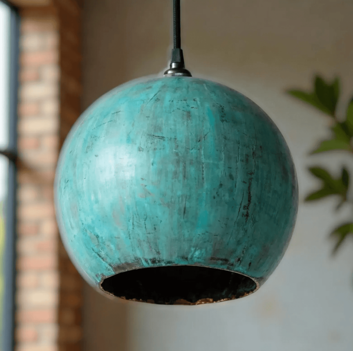 Green Patina Copper Pendant Light hanging in a modern interior with a rustic vibe.