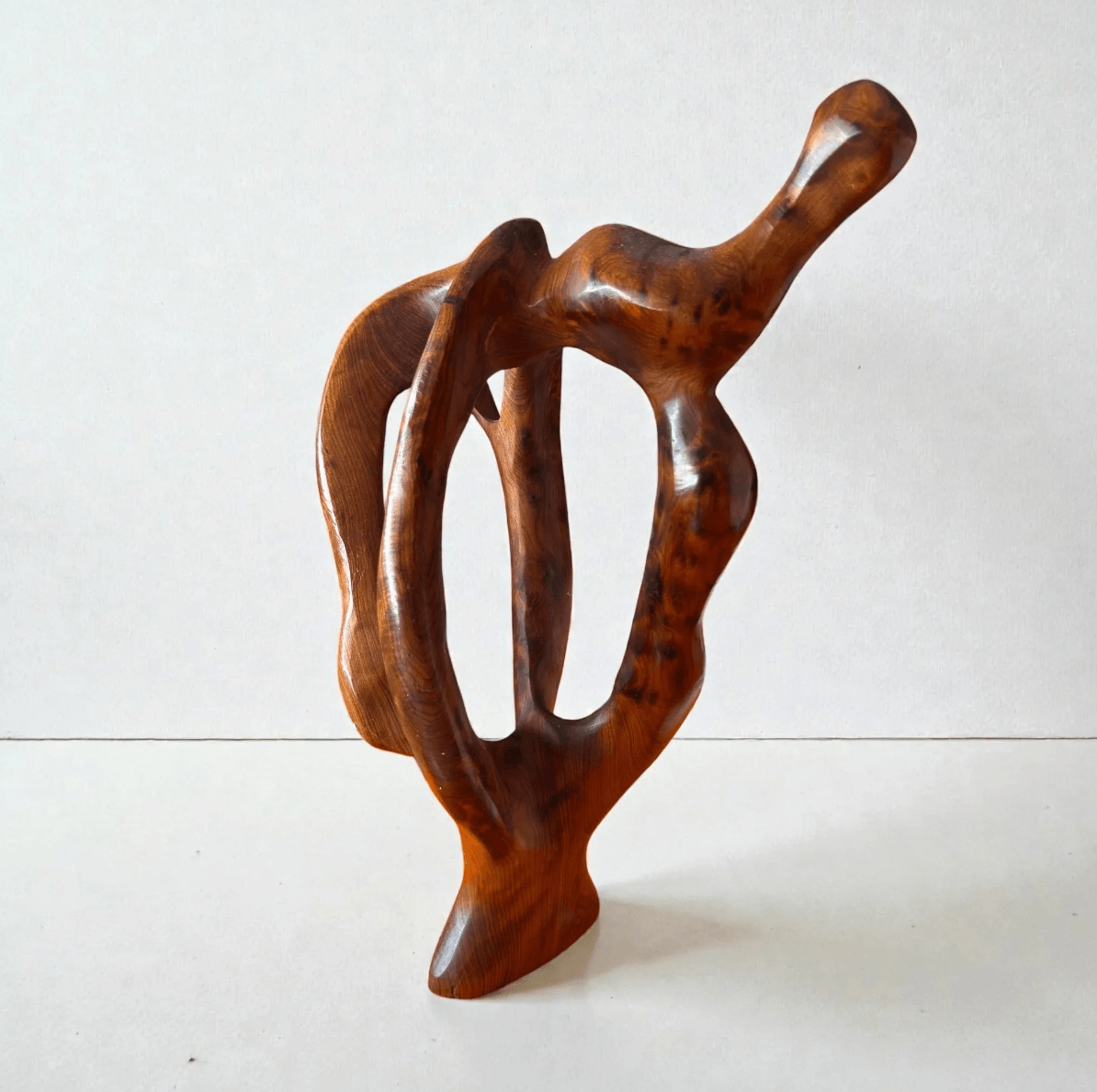 Wooden sculpture on a white background