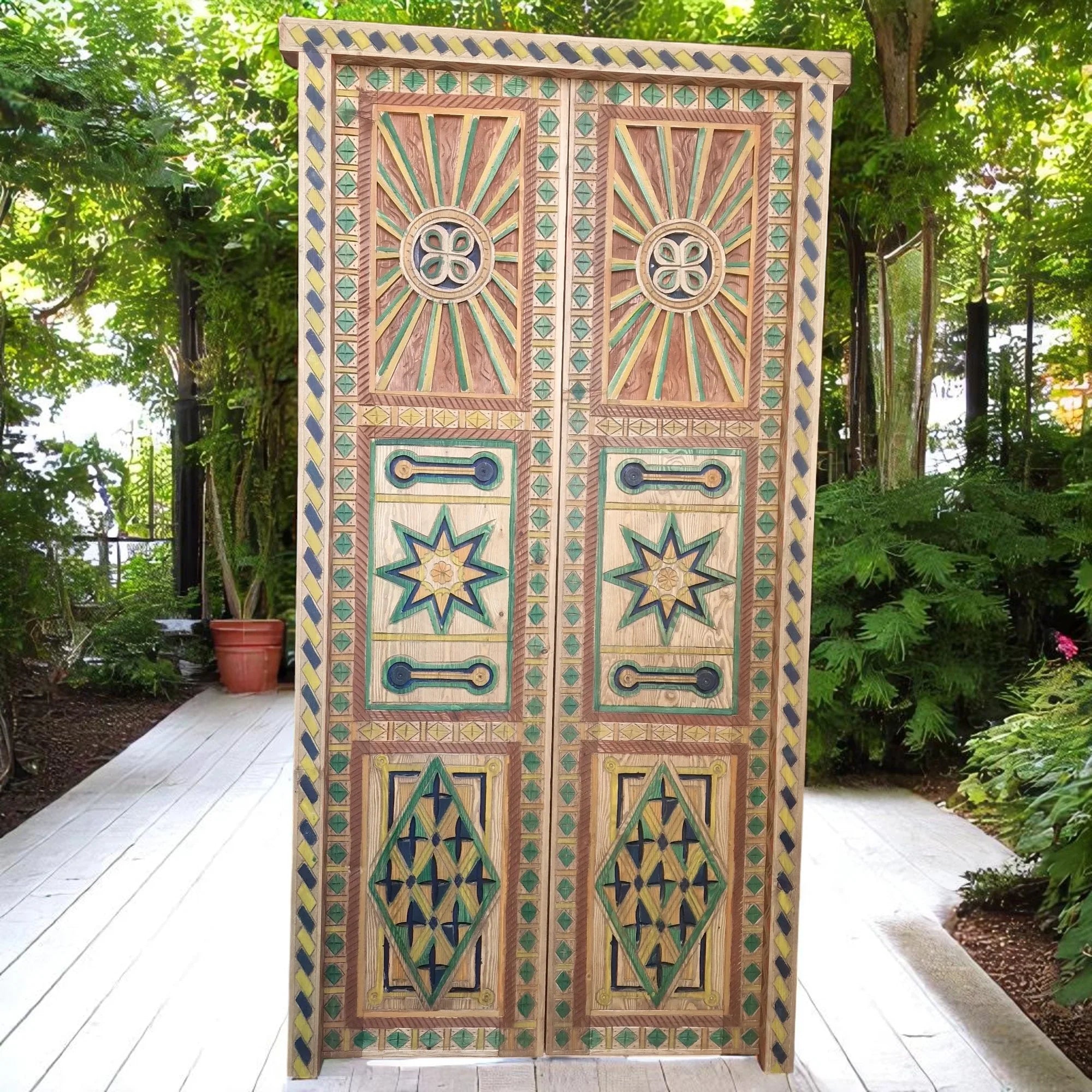 Custom handcrafted Moroccan wooden door with traditional carvings made to order in custom sizes.