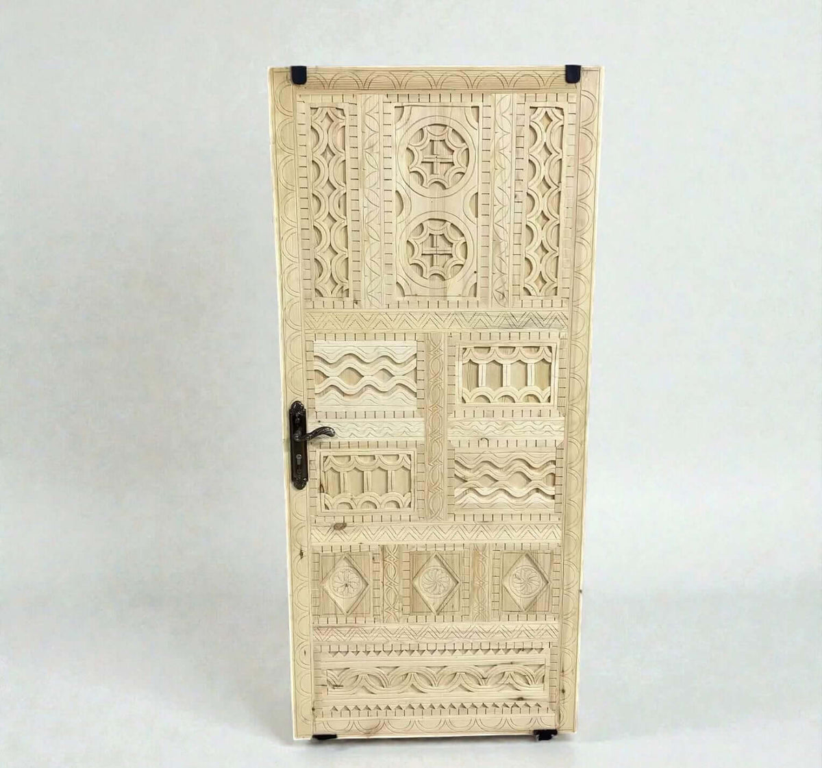 AtlasMuseCrafts vintage Moroccan carved wood door with intricate geometric and arabesque patterns. Natural wood finish.