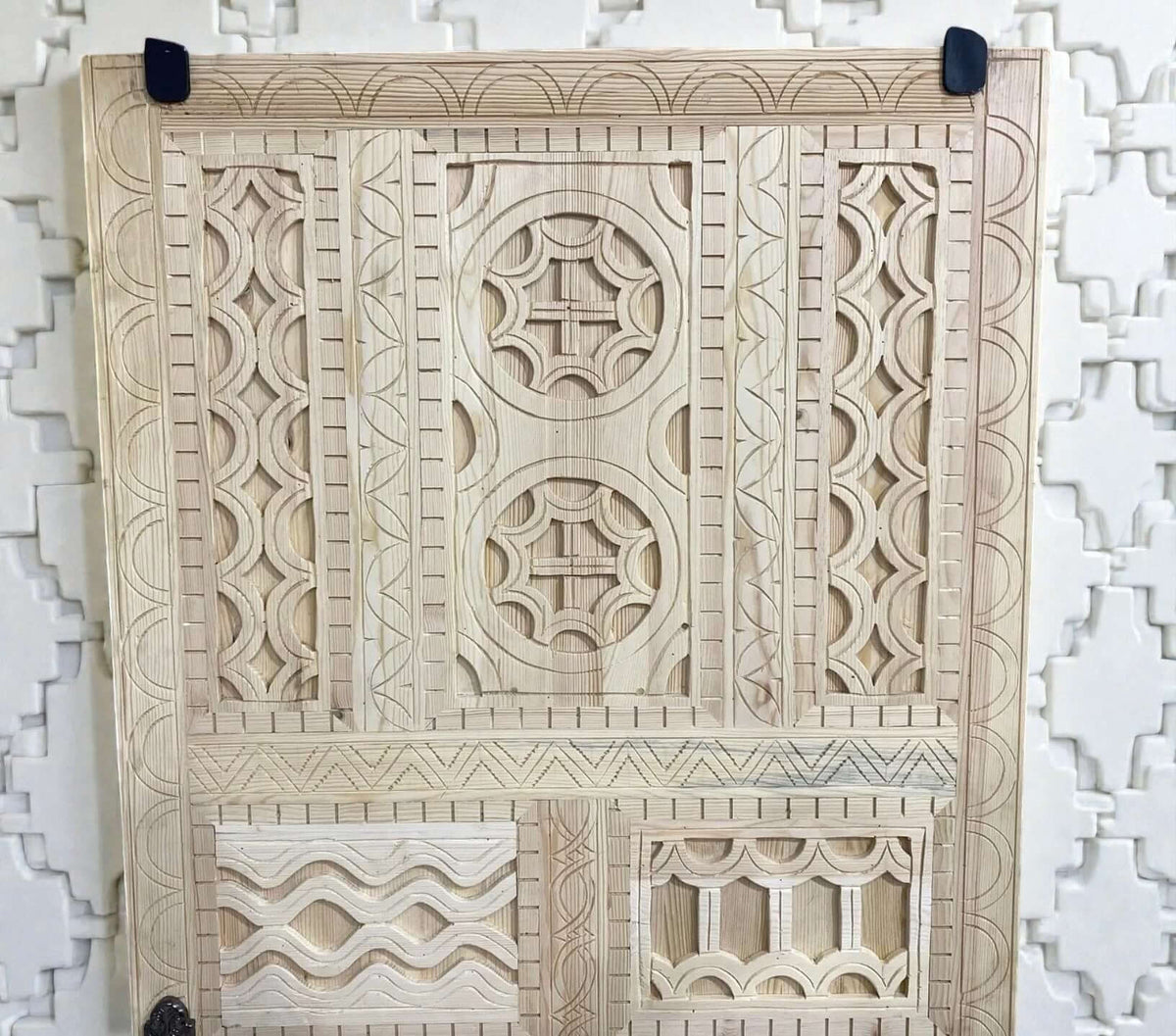 AtlasMuseCrafts vintage Moroccan carved wood door with intricate geometric and arabesque patterns. Natural wood.