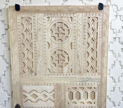 AtlasMuseCrafts vintage Moroccan carved wood door with intricate geometric and arabesque patterns. Natural wood.