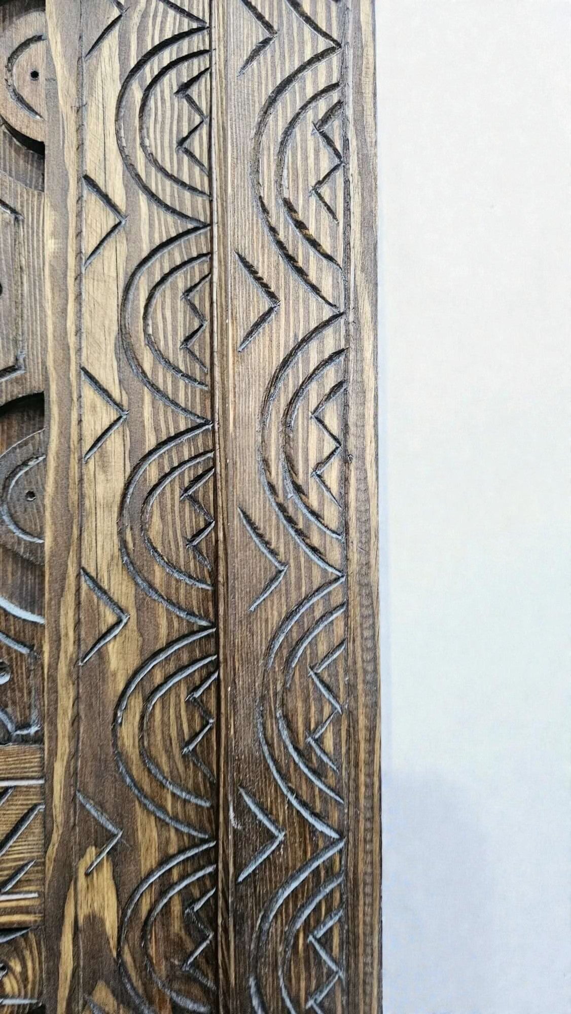 AtlasMuseCrafts antique Moroccan door, natural wood with intricate Berber carving. Authentic aged finish.