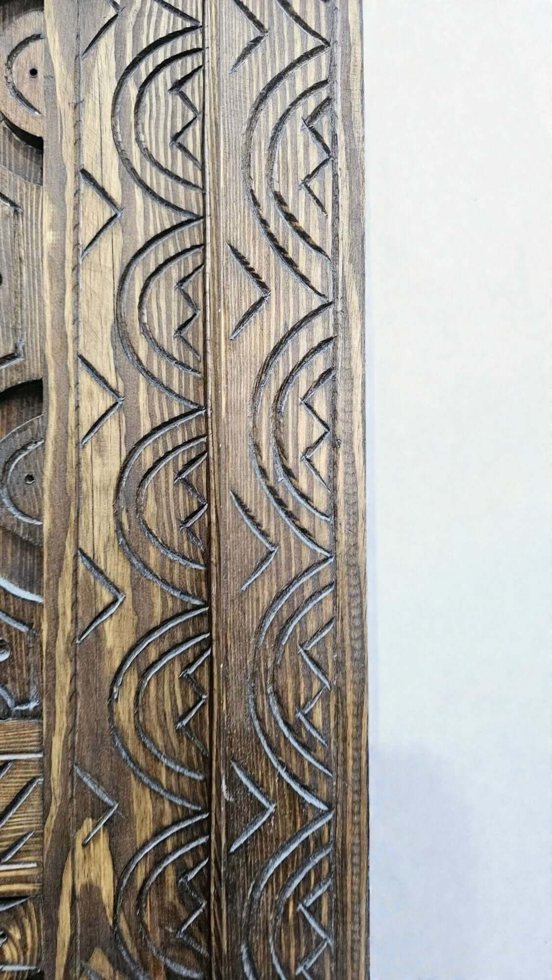 AtlasMuseCrafts antique Moroccan door, natural wood with intricate Berber carving. Authentic aged finish.