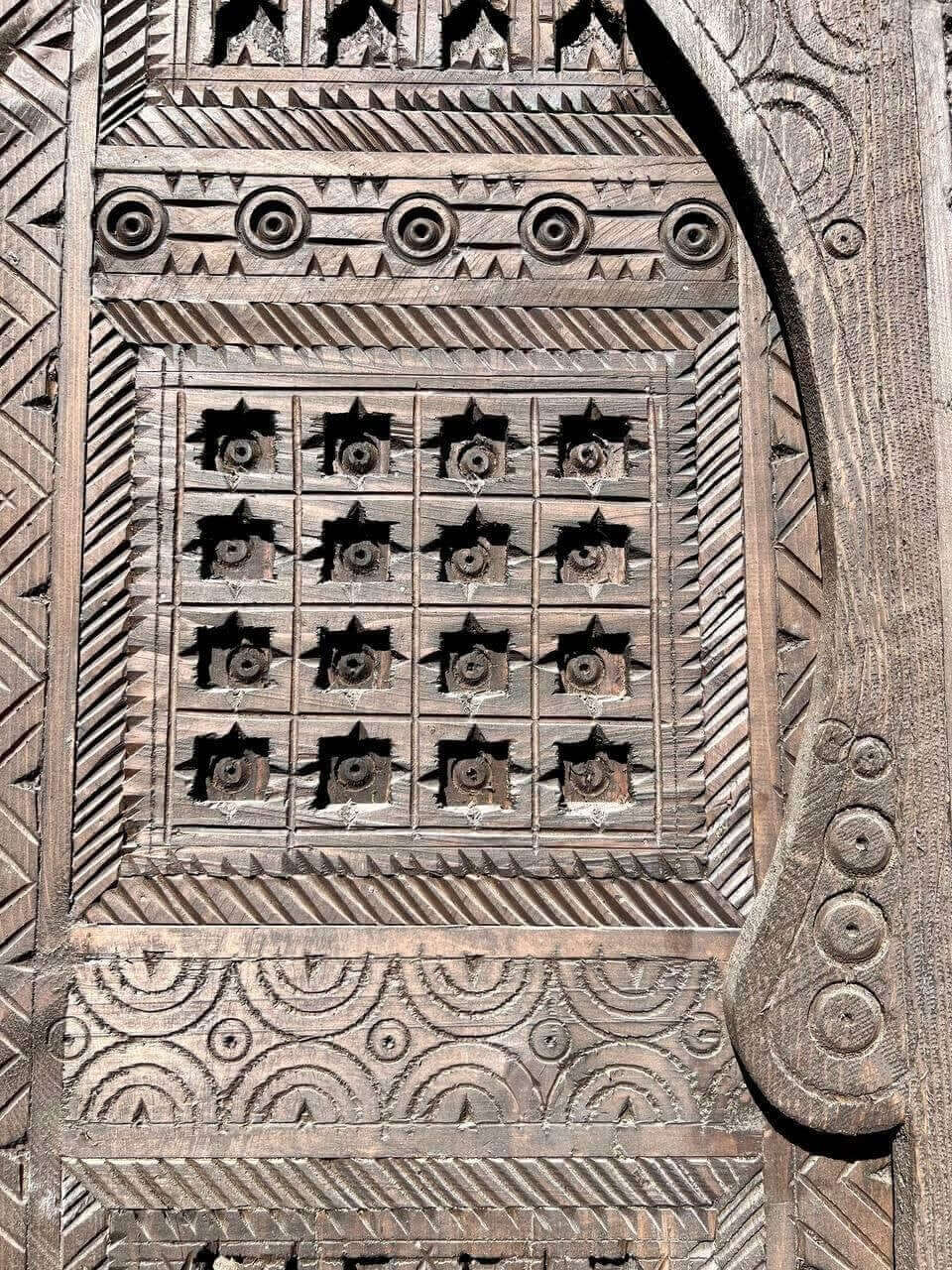AtlasMuseCrafts vintage Moroccan double door, natural wood with intricate Moorish hand-carving and geometric patterns.