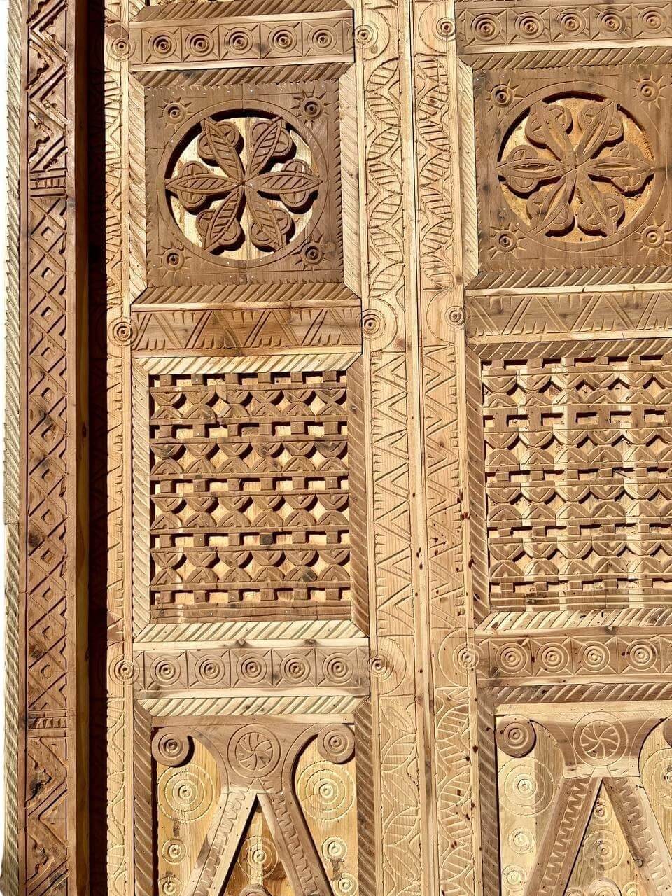 AtlasMuseCrafts antique Moroccan double door with intricate hand-carving in natural wood.