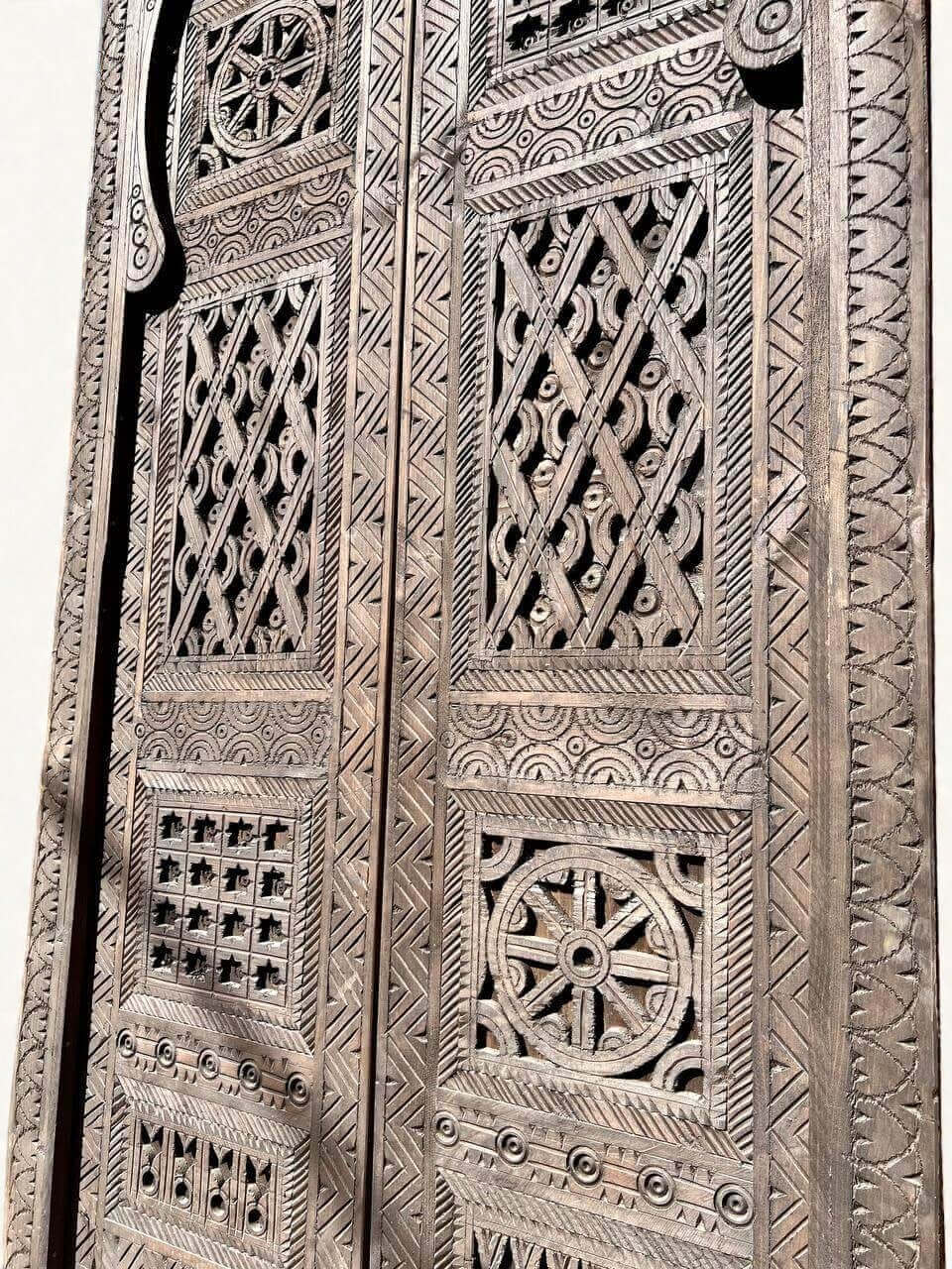 AtlasMuseCrafts vintage Moroccan double doors, natural wood with intricate Moorish hand-carving, geometric patterns, and a rustic finish.