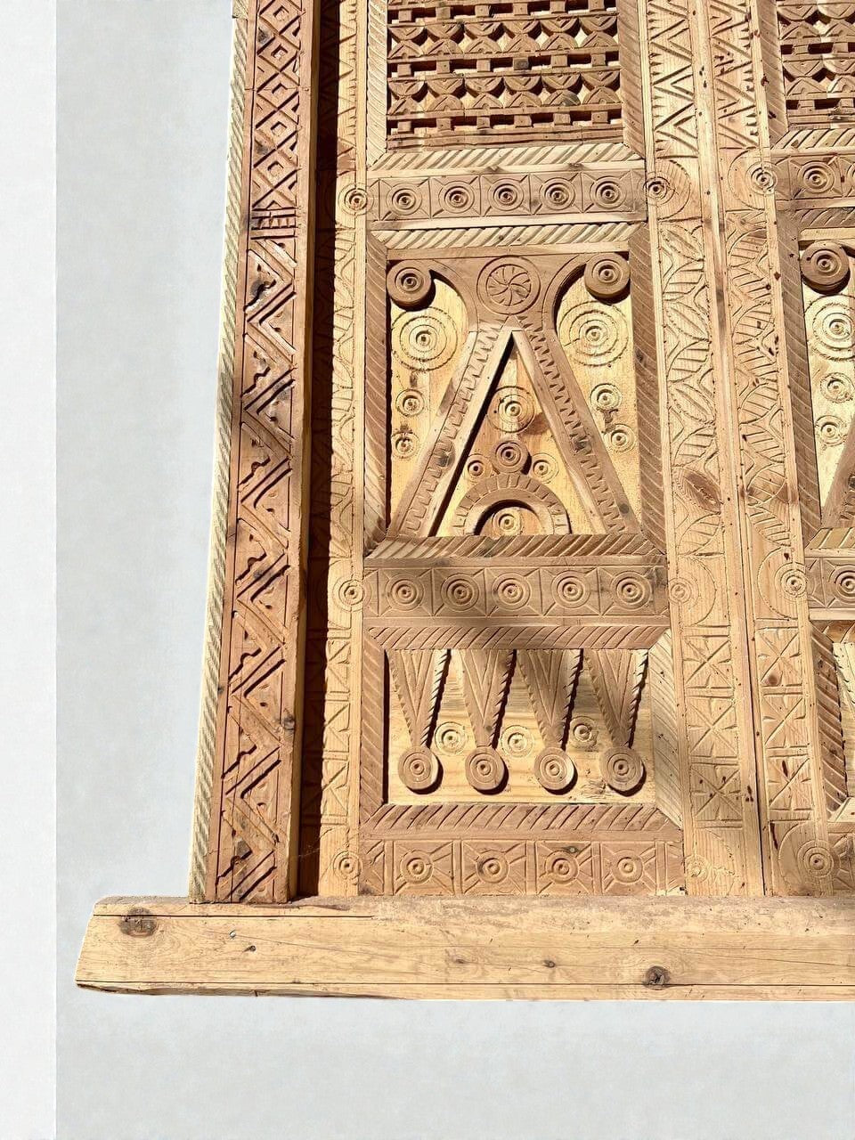 AtlasMuseCrafts antique Moroccan double door in natural wood with intricate Moorish hand-carving and geometric patterns.