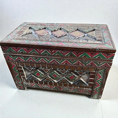 AtlasMuseCrafts custom Moroccan wood cabinet with intricate Berber carvings in red, green, and yellow. Rustic boho storage chest.