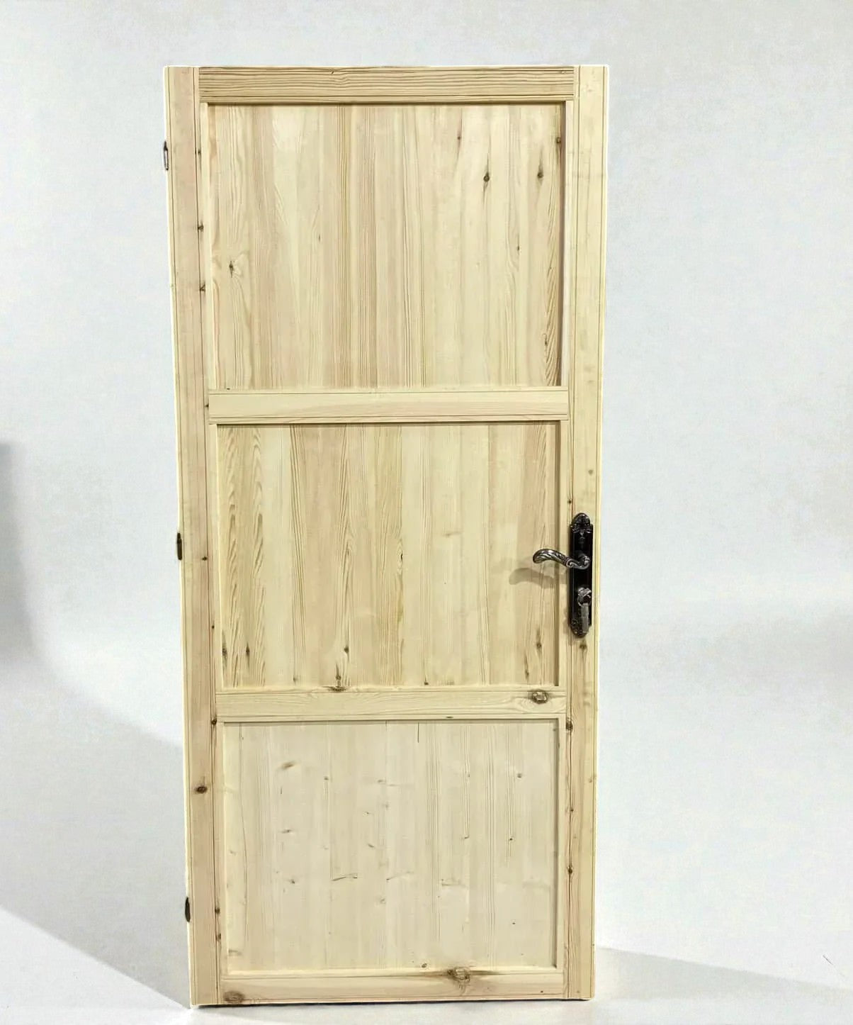 AtlasMuseCrafts natural wood vintage Moroccan door with Moorish hand-carving and ornate handle.