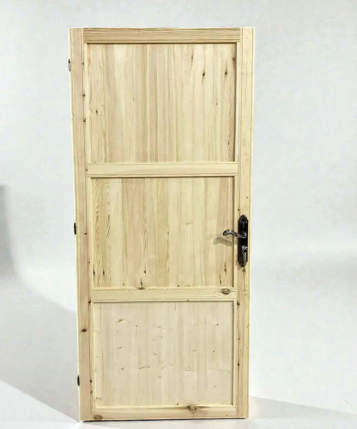 AtlasMuseCrafts natural wood vintage Moroccan door with Moorish hand-carving and ornate handle.