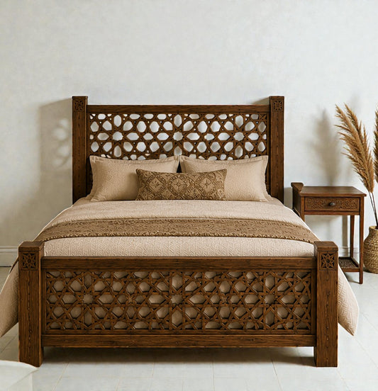 AtlasMuseCrafts handcrafted Moroccan wooden bed frame with intricate geometric carvings on headboard and footboard. Solid wood, warm brown finish.