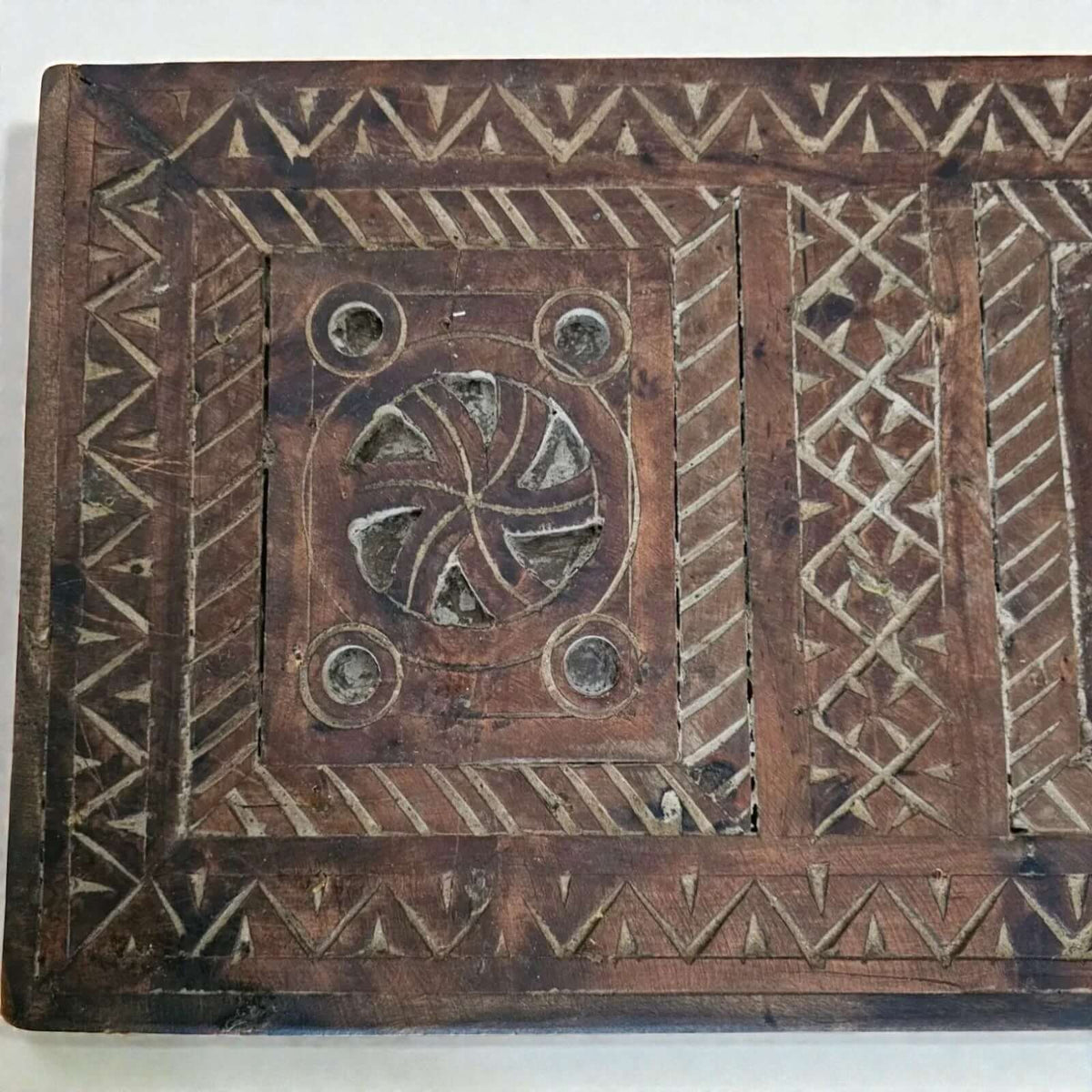 AtlasMuseCrafts Moroccan wooden cabinet with intricate hand-carved Berber patterns and rustic boho design. Features a circular motif and geometric borders.