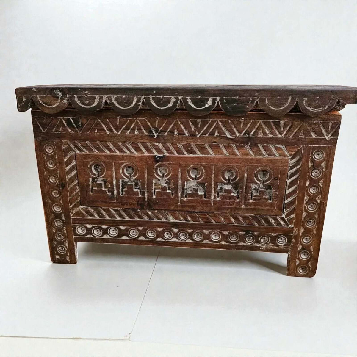 AtlasMuseCrafts Moroccan wooden cabinet with intricate hand-carved Berber patterns and scalloped edge detail. Rustic boho style.