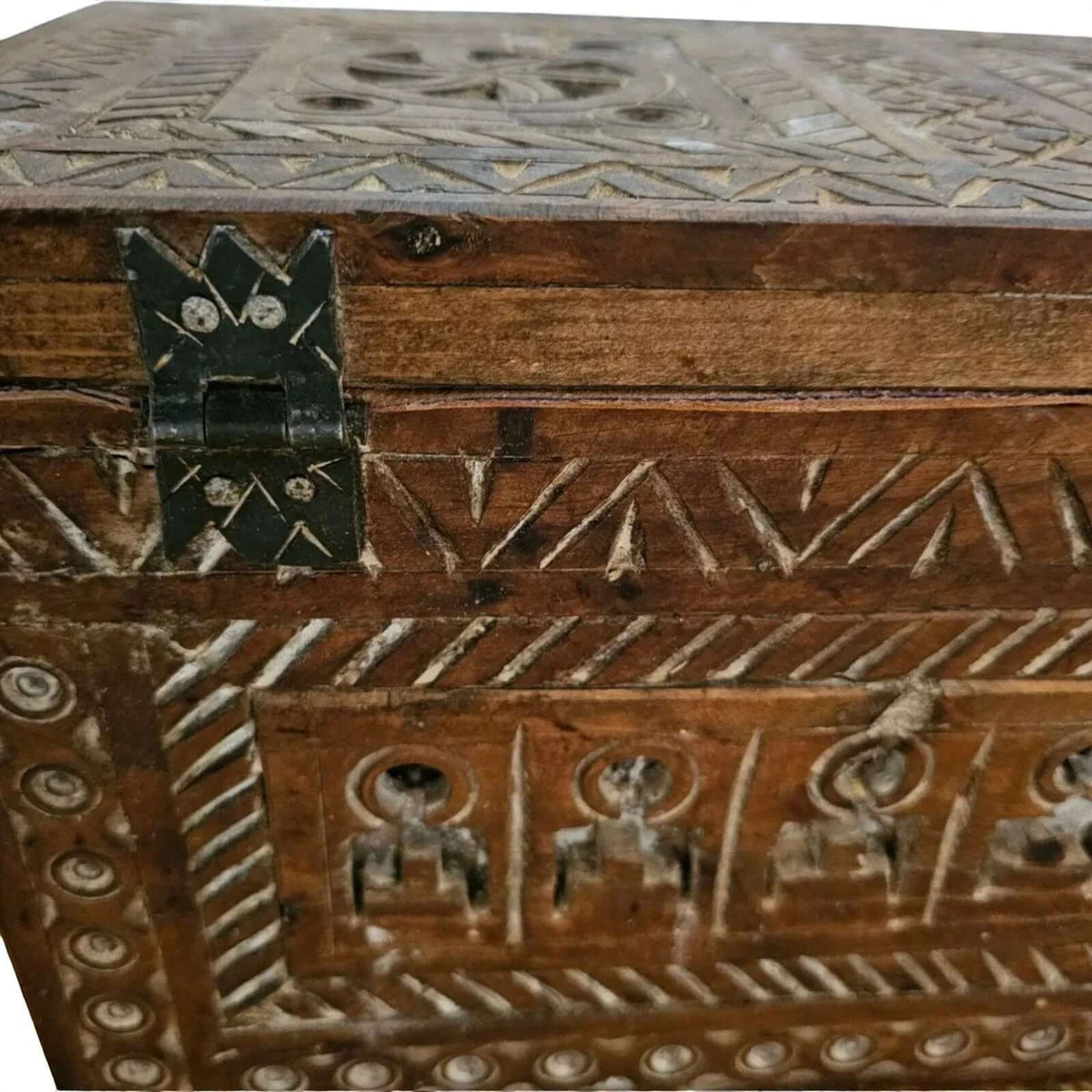 AtlasMuseCrafts Moroccan wooden cabinet with intricate hand-carved Berber patterns and metal hinges. Rustic boho style.