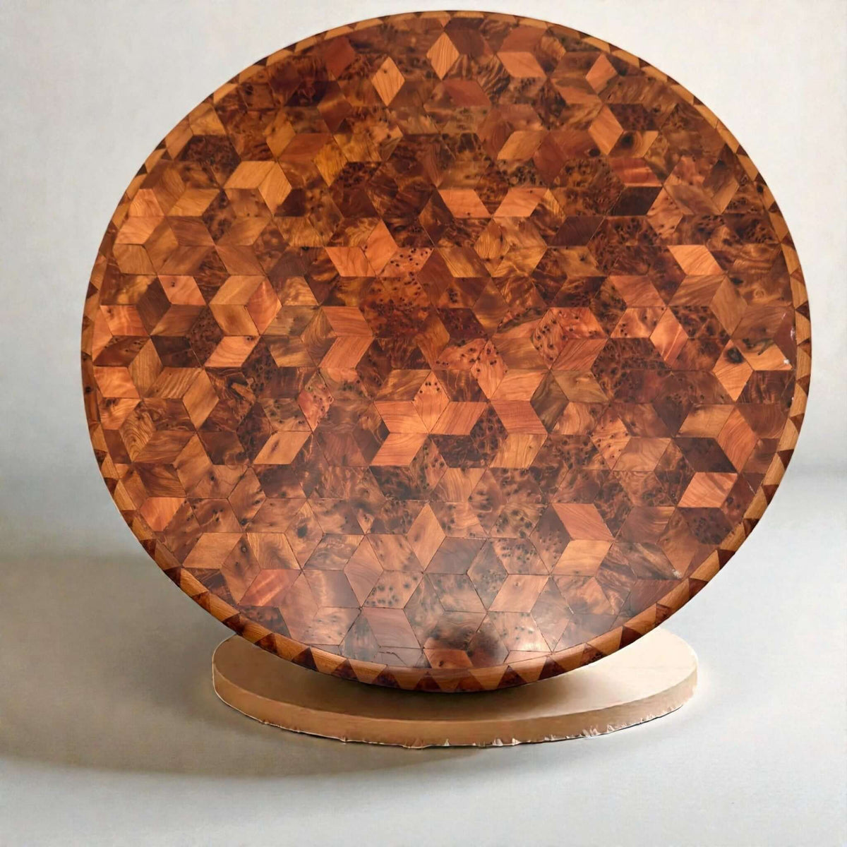 Round solid wood coffee table with geometric wood inlay