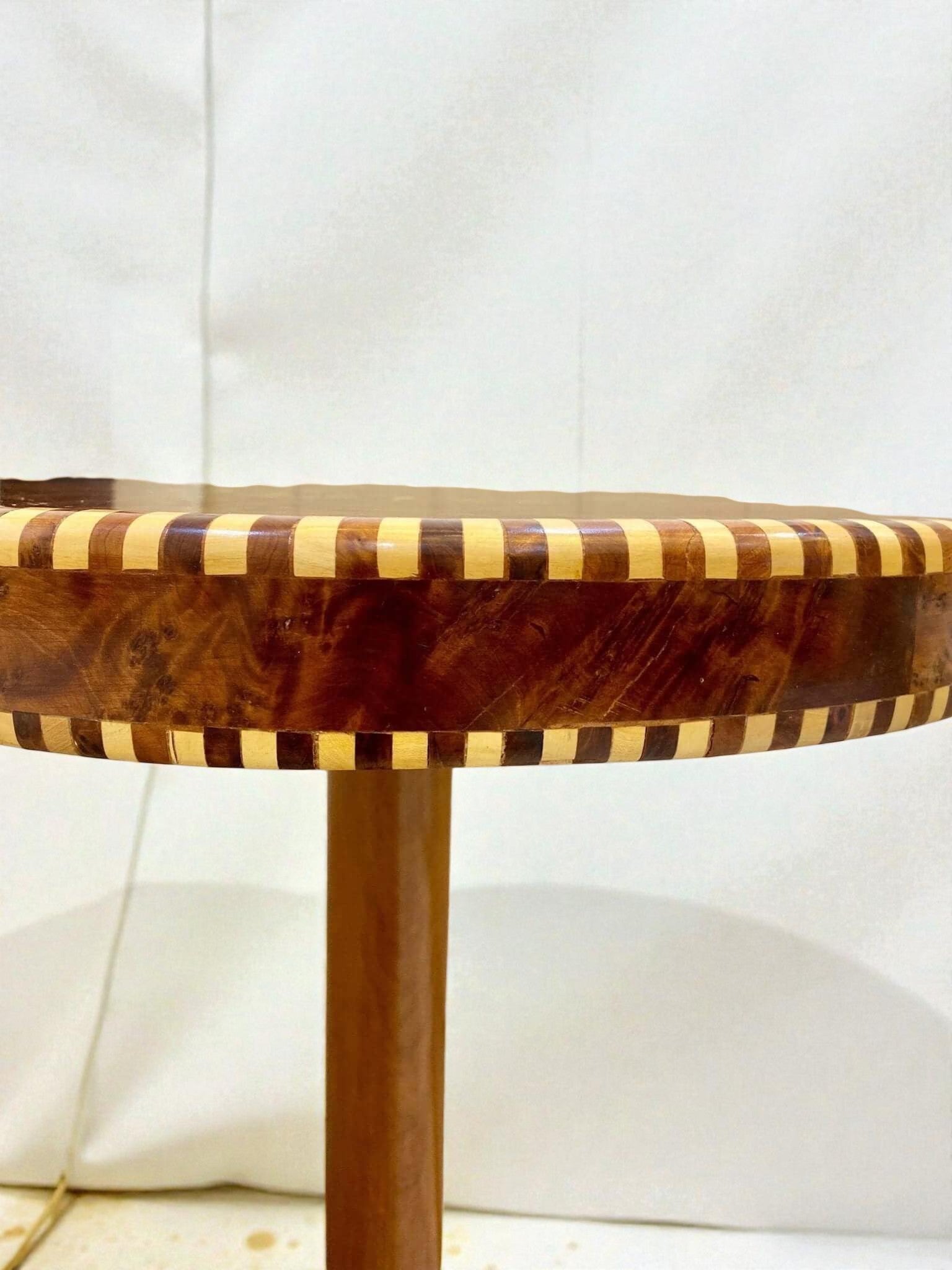 AtlasMuseCrafts handmade Thuya mosaic coffee table with decorative wood inlay and striped border. Moroccan accent table.