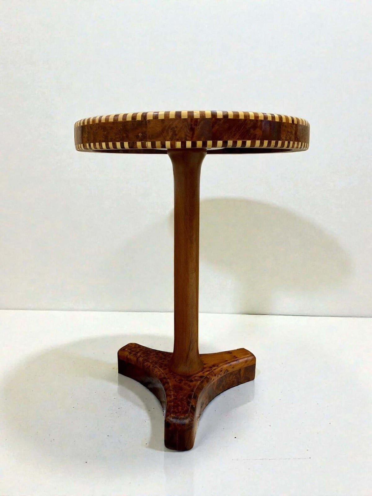 Thuya mosaic coffee table with wood inlay and tripod base