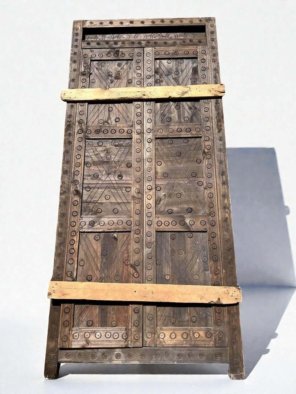 AtlasMuseCrafts vintage Moroccan double door made of natural wood with intricate Moorish hand-carving and a rustic finish.