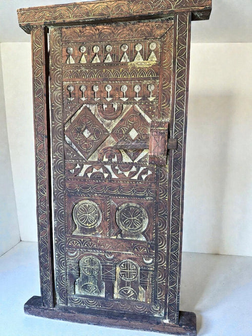 AtlasMuseCrafts vintage wooden door with floral carvings and antique brass knob. Natural wood with aged patina.