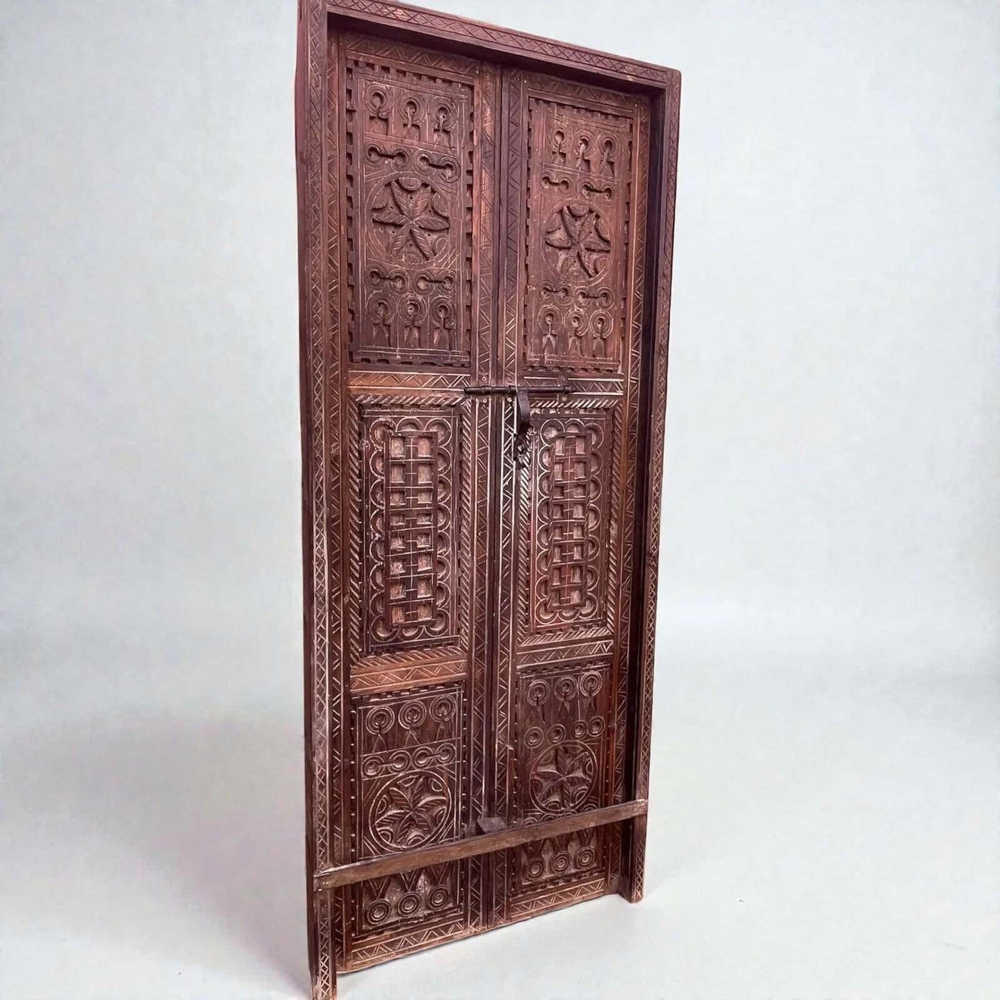 AtlasMuseCrafts hand-carved wooden double panel door with intricate geometric motifs in natural wood finish.