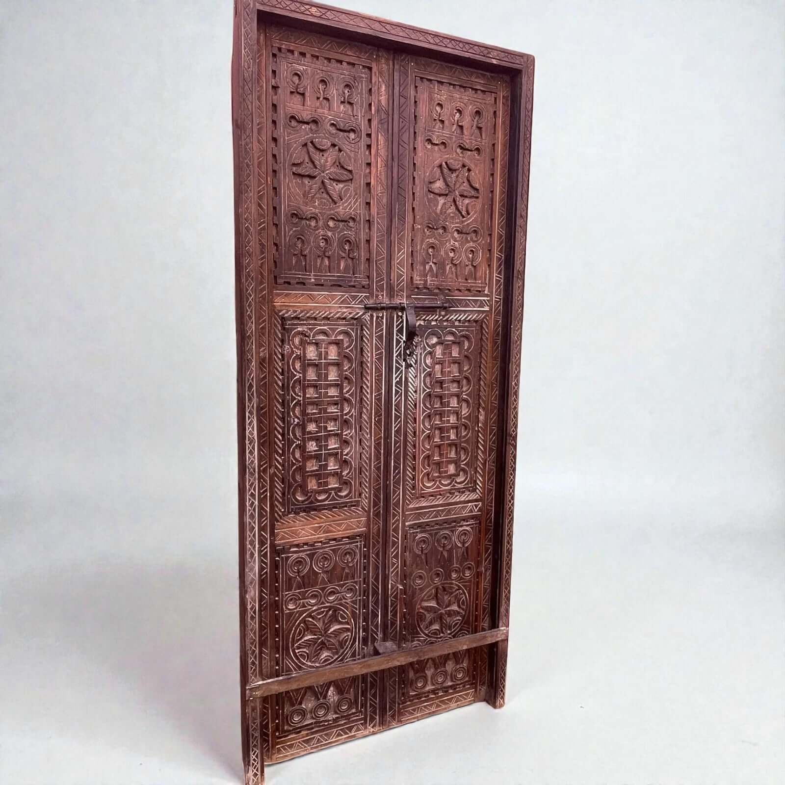 AtlasMuseCrafts hand-carved wooden double panel door with intricate geometric motifs in natural wood finish.