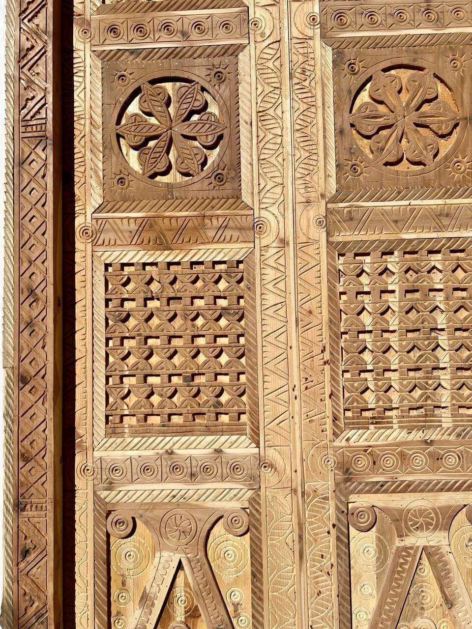 AtlasMuseCrafts antique double wood door with intricate Moorish hand-carving, arabesque, and geometric patterns.