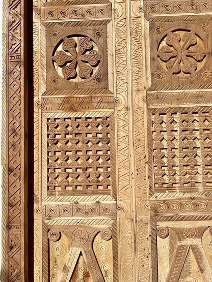 AtlasMuseCrafts antique double wood door with intricate Moorish hand-carving, arabesque, and geometric patterns.