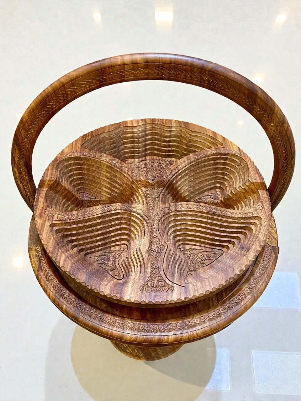 Handmade carved wooden folding fruit basket with handle in natural wood