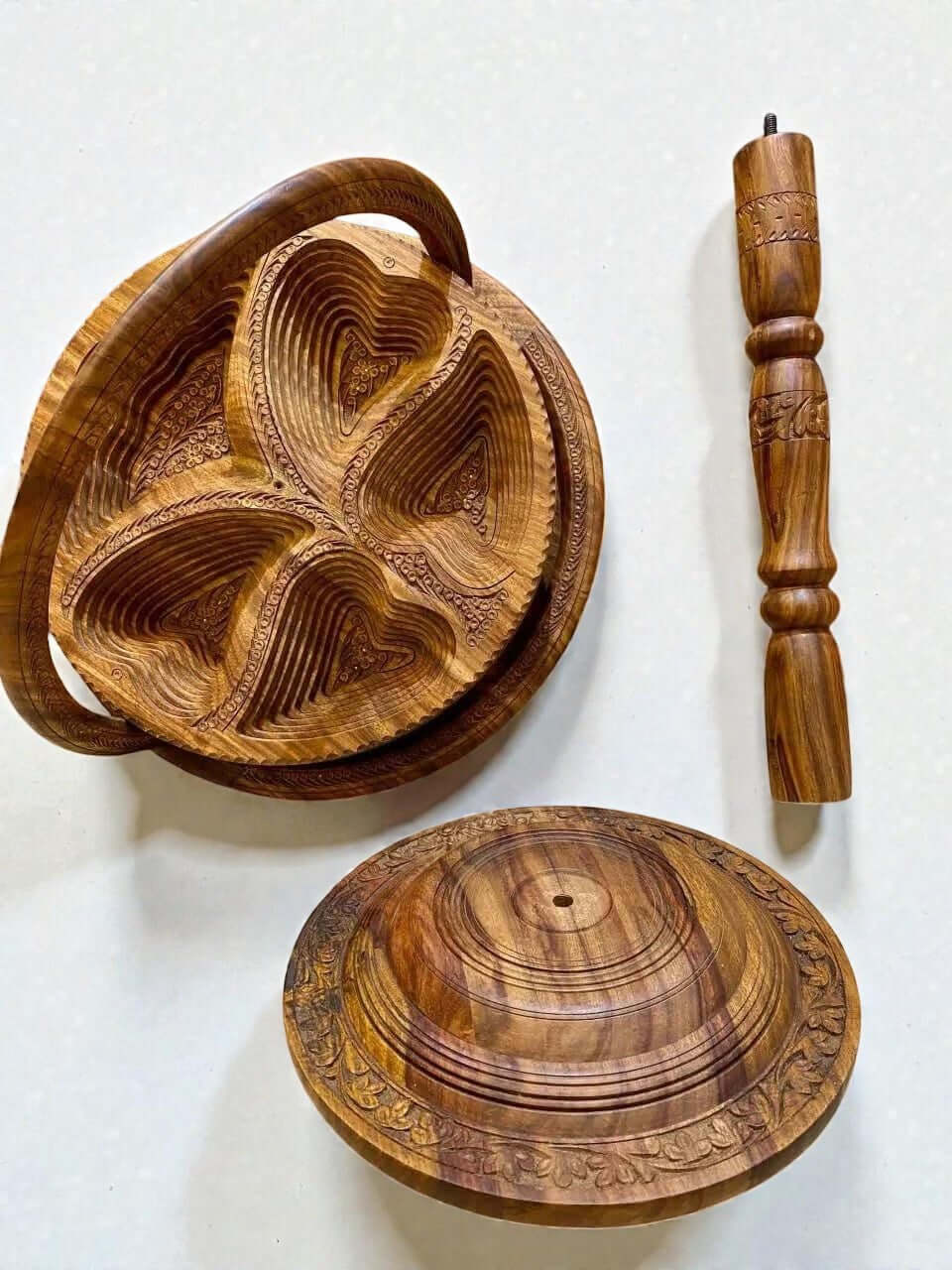 Carved wooden folding fruit basket with handle, base and legs