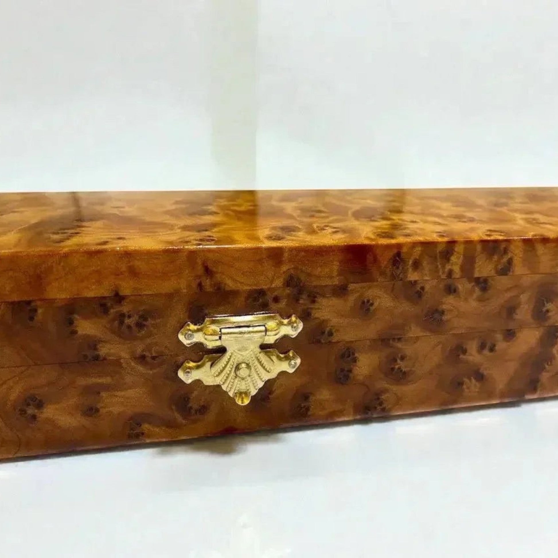 AtlasMuseCrafts elegant Thuya burl wood box with brass latch, ideal for display or storage.
